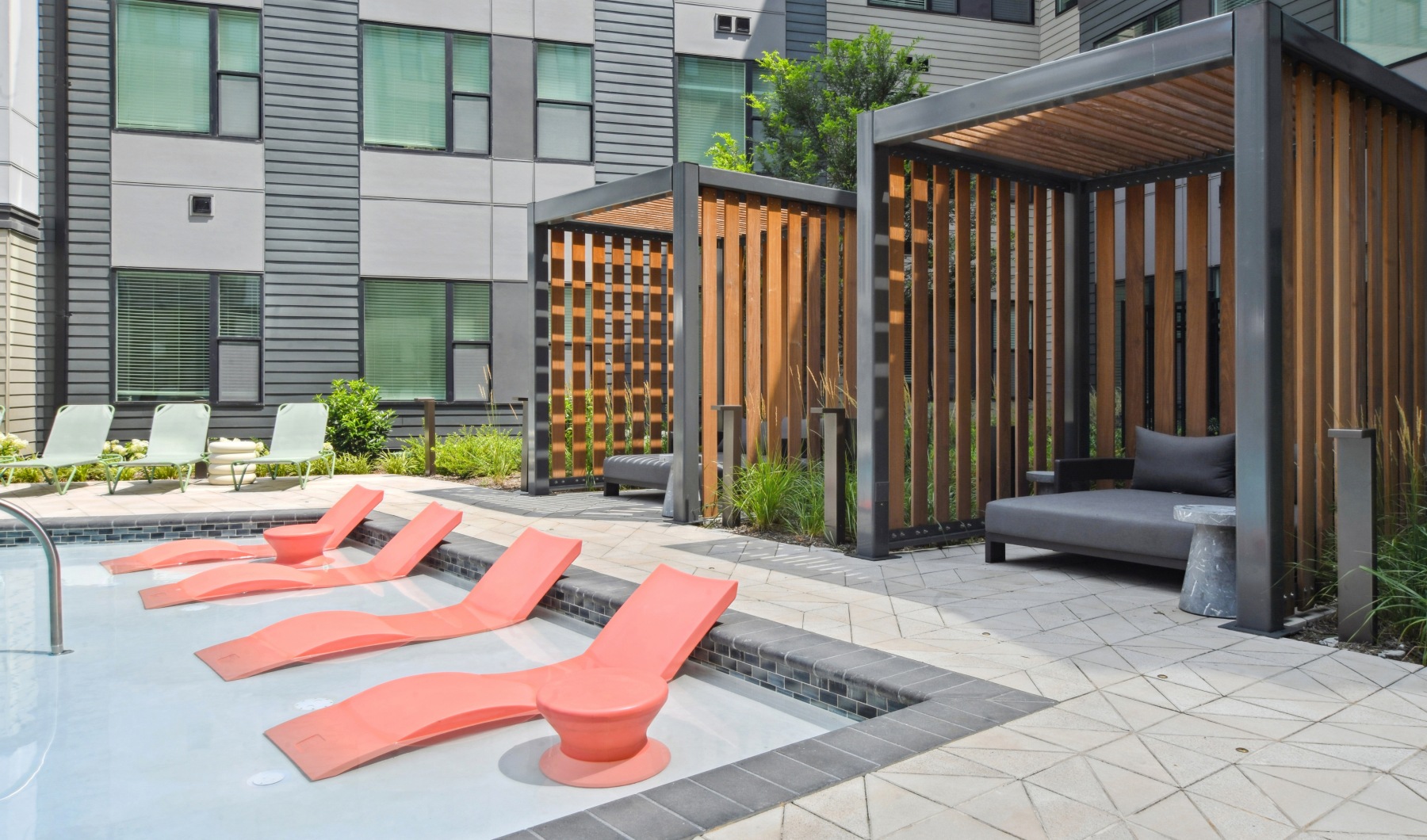 Resort-style pool with cabanas Resort-style pool with cabanas