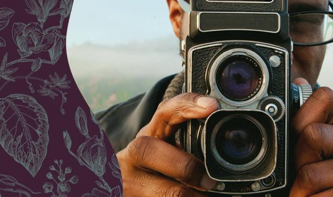 Settle into comfort at The Devon a person holding a camera